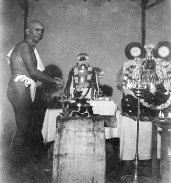 Bhagavan inside the Mother's Samadhi in the 1930s