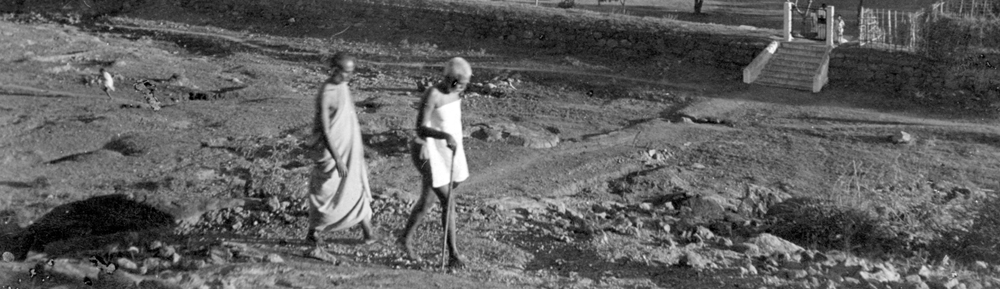 Bhagavan walking on the lower slopes of Arunachala with Yogi Ramaiah