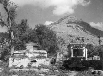 The graves opposite the Dakshinamurti Shrine in the 1940s. Since they were located on highway property, they were demolished during a road-widening scheme.