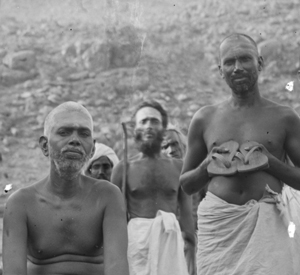 Perumal Swami, holding the sandals