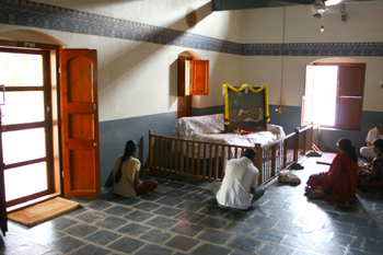 The railing around Bhagavan's sofa