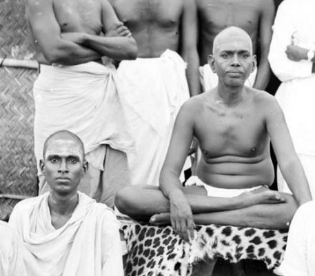 Viswanatha Swami sitting with Bhagavan in the 1920s