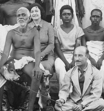 Paul Brunton sitting with Bhagavan around 1930.