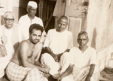 An early photo of Maharaj, second from the right