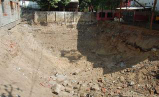 Despite its holy history, The Tiruparkadal Tank (shown her) is in a derelict state. In recent times it was encrioached on by a neighbouring school, and this is all that remains of it.