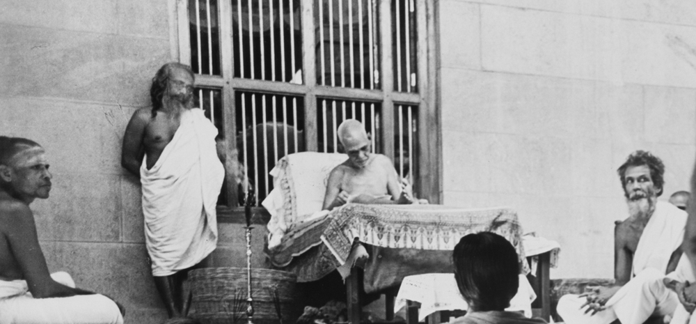 Muruganar (right) sitting with Bhagavan