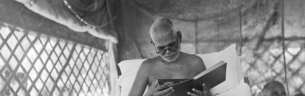 Bhagavan reading in the Jubilee Hall