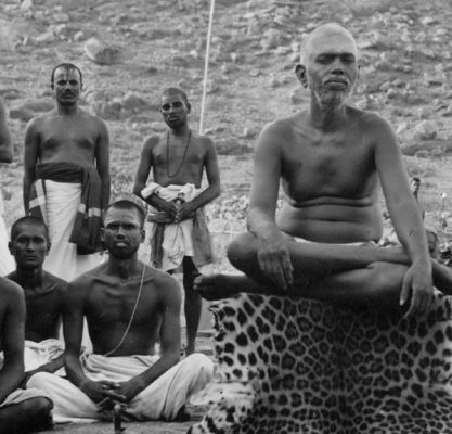 Muruganar (front right) sitting with Bhagavan