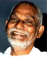 Lakshmana-Swamy-smiling-sli