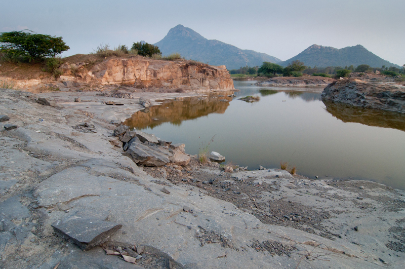 The Adi-annamalai stone quarry, with Arunachala in the background